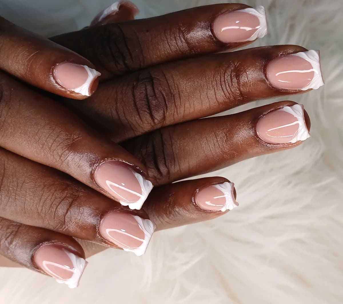 Gel X nail extensions with pink French tip at Glit Nails Accra Ghana