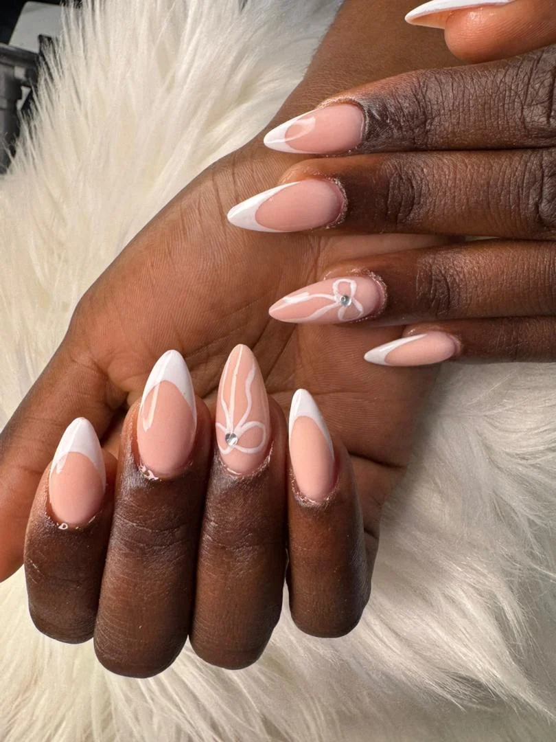 Stick on nails with vibrant colour design at Glit Nails Osu Accra